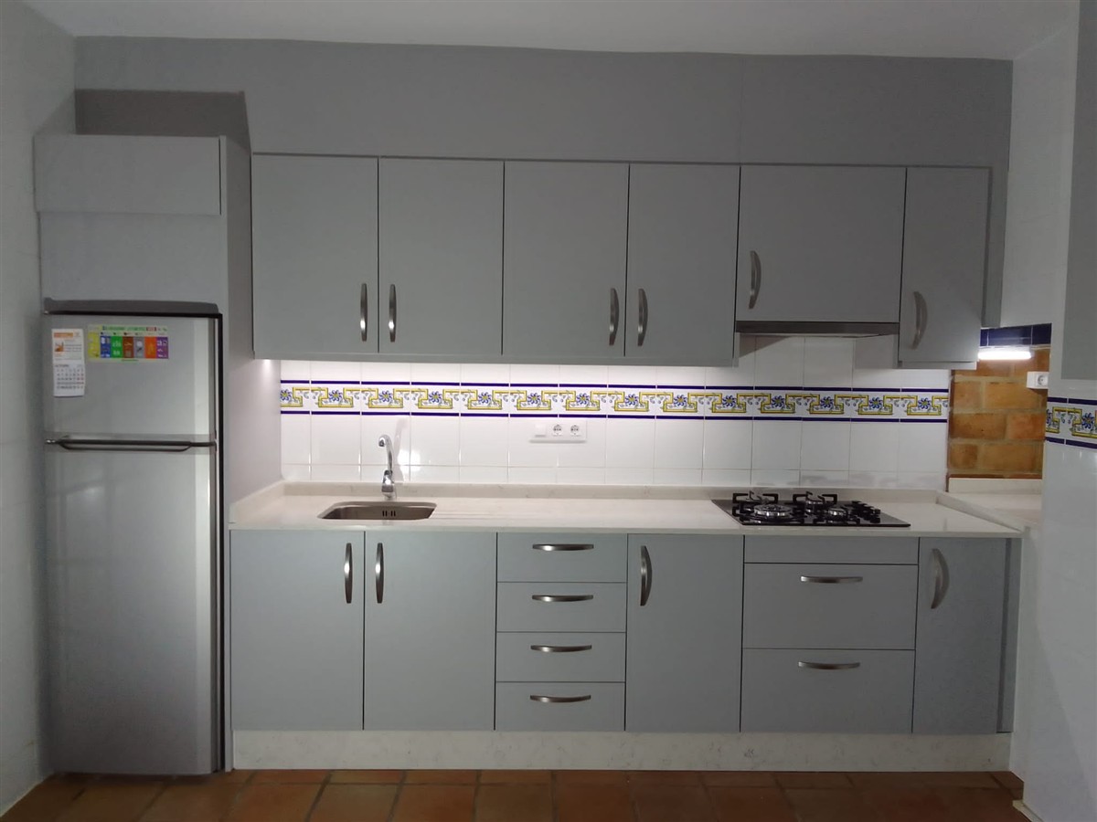 Kitchen in the Orange Grove Apartment installed in 2025