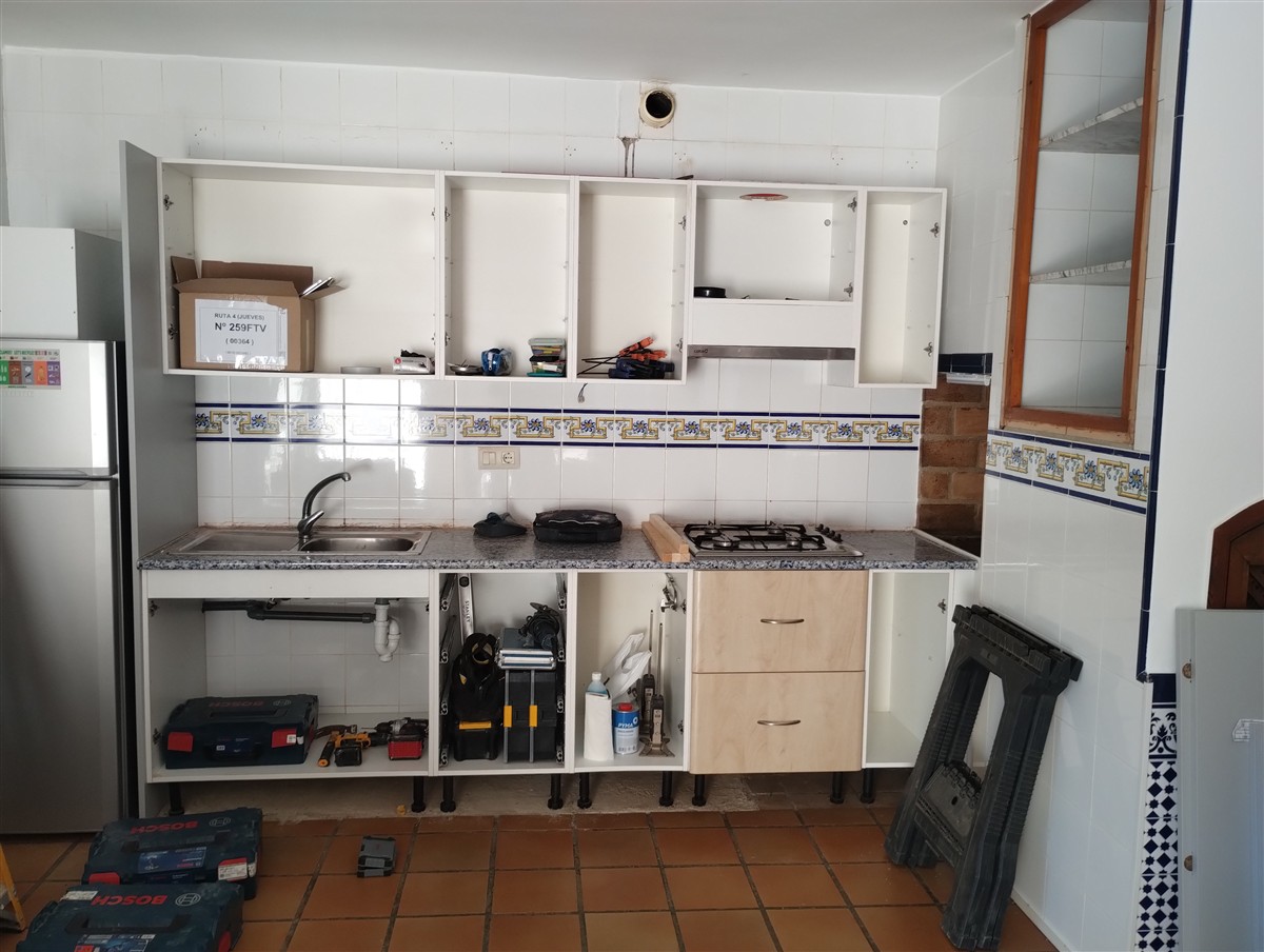 Removing the old kitchen Removing the old kitchen at the Orange Grove Apartment