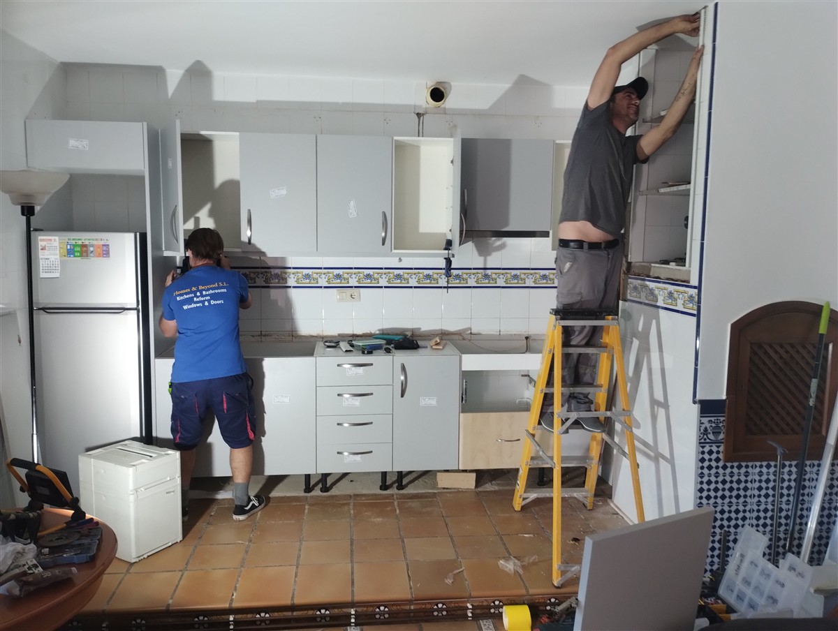 Homes and Beyond working hard Orange Grove apartment new kitchen